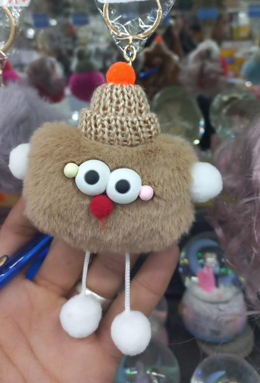 Hand-knitted Furry Keychain With Orange Pom Pom
